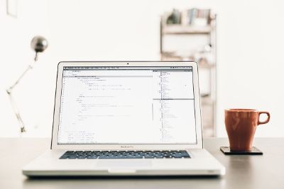 laptop and a coffee cup