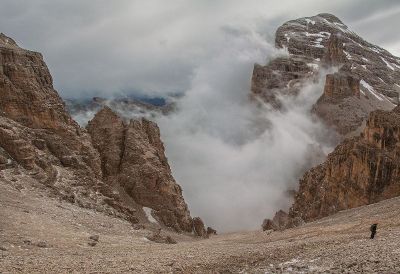 single hiker on a mountain slope