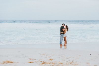 kissing on the beach