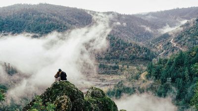 couple enjoying mountain spot