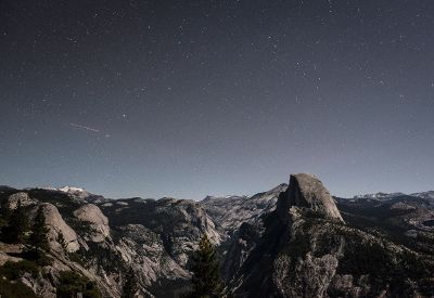 starry sky above rocky terrain