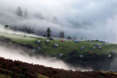 hillside in the clouds