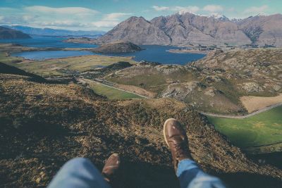 some one sitting in a mountain area