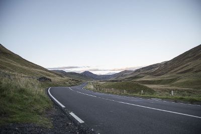 highway winding through the hillside