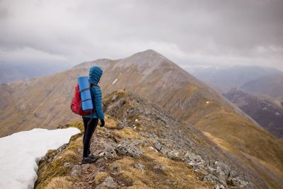 backpacker at top of mountain