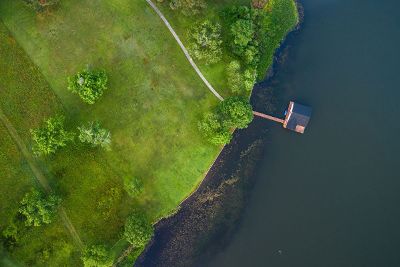 aerial view of house by water