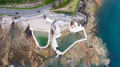 overhead view of building next to water