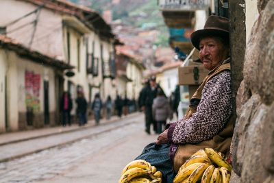 old woman with bananas