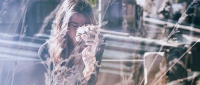 woman mourning over grave