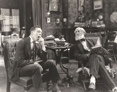 men sitting in chairs