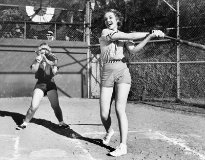 women playing baseball