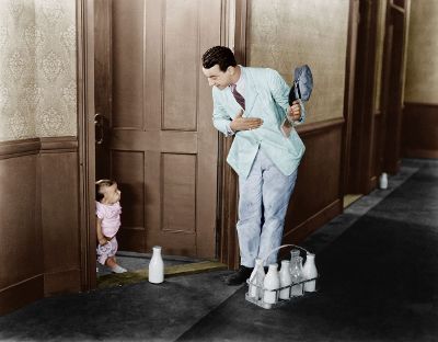 milkman delivering milk to baby