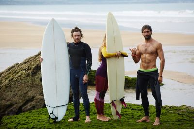 surfers on beach