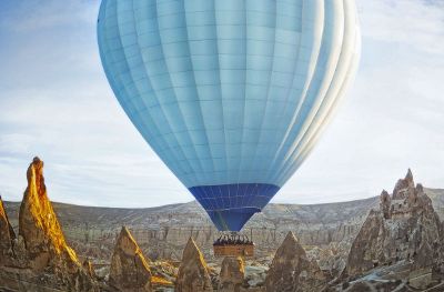 blue hot air balloon in dessert